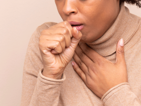 Woman coughing